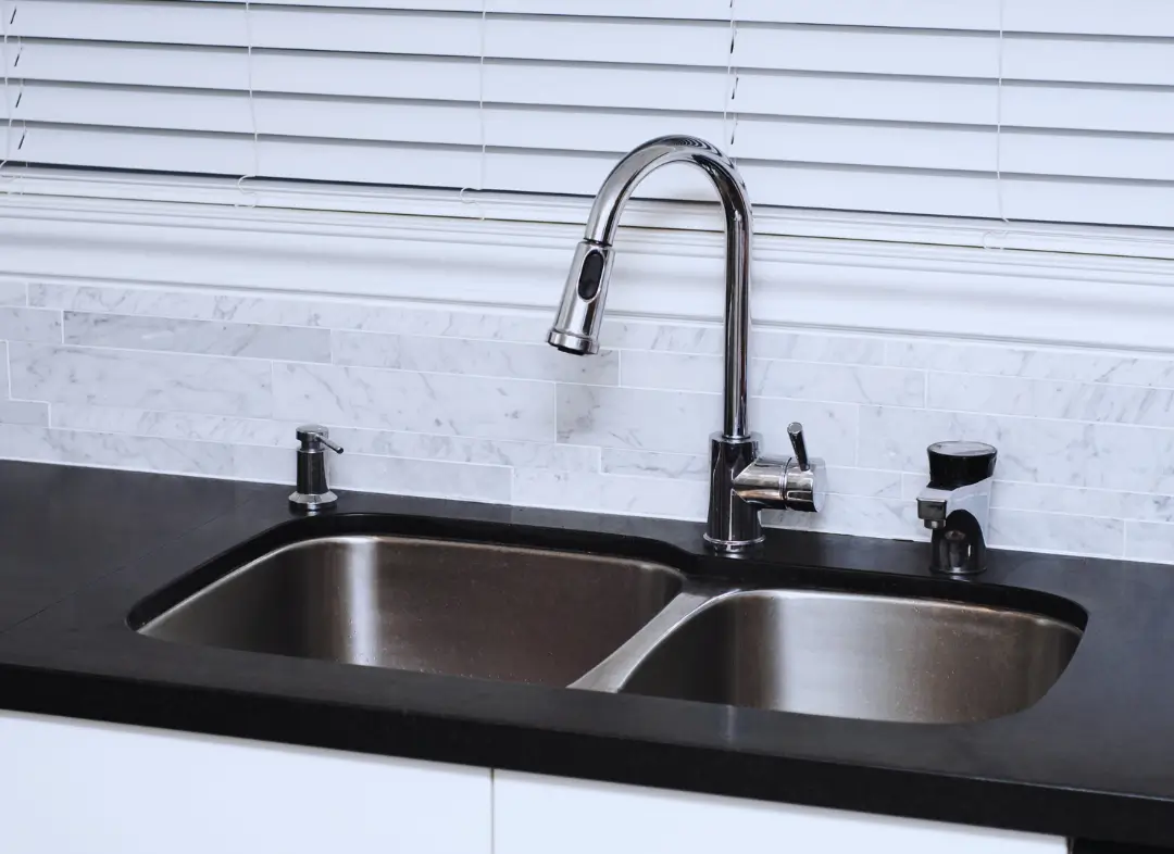 Changement Mitigeur d'évier Entrelacs